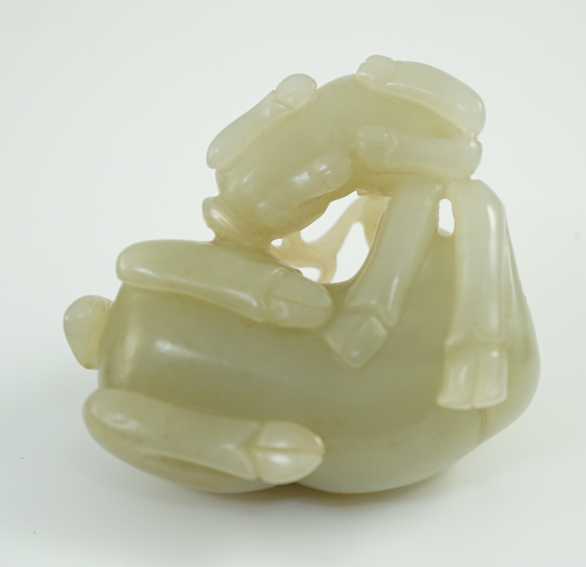 A Chinese pale celadon jade ram group, 7cm long